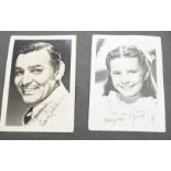 A vintage black and white photograph album with some autographs including Lucille Ball and