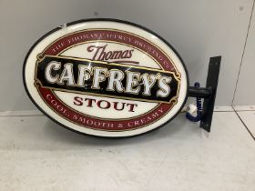 A Caffrey's illuminated double sided pub sign, width with bracket 75cm, height 46cm