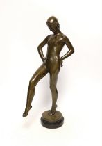 After Daniel-Joseph Bacqué (1874-1947), a bronze figure of an Art Deco woman, raised on circular