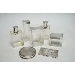 Five assorted silver topped glass toilet jars, a silver compact and an Edwardian engraved silver