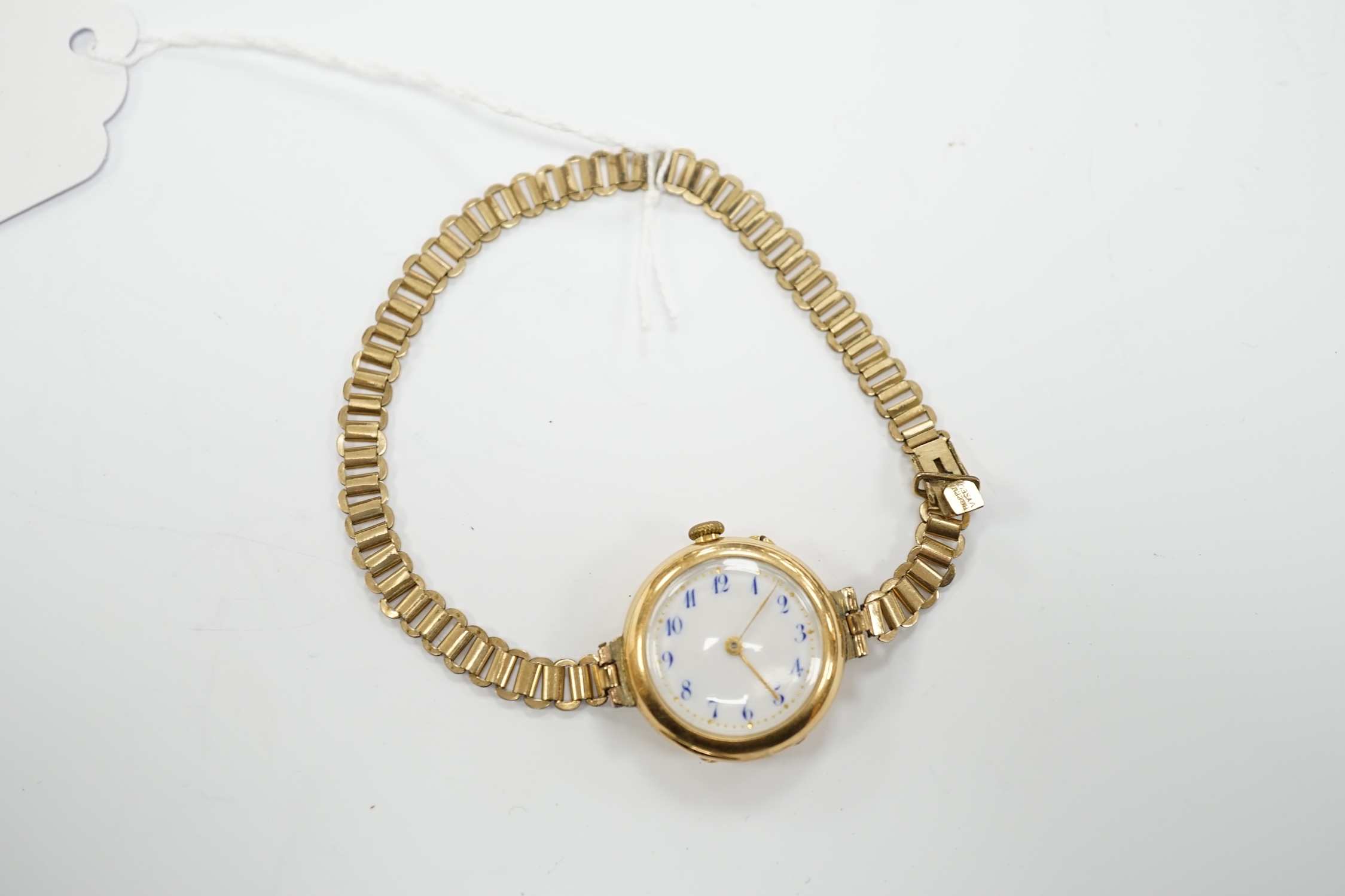 An early 20th century 15ct gold manual wind wrist watch, on a rolled gold bracelet. - Image 2 of 4