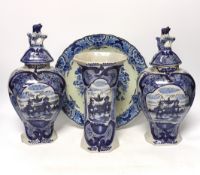 A late 18th century Delft garniture of three vases, two with covers, 32cm, together with a modern