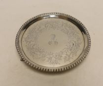 A George III silver waiter by Ebenezer Coker, London, 1771, with later engraved decoration, 15.