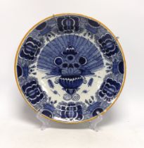 A late 18th century Delft blue and white ‘peacock’ dish, 36cm diameter