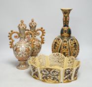 Hungarian pottery comprising pair of Zsolnay vases and covers, a pierced vase and a dish, 30cm high