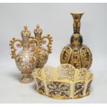 Hungarian pottery comprising pair of Zsolnay vases and covers, a pierced vase and a dish, 30cm high