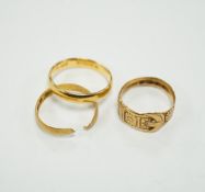 Two 22ct gold wedding bands (one cut), 5.8 grams and an 18ct gold buckle ring, 2.9 grams.