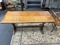 An Arts & Crafts style rectangular oak refectory dining table, width 175cm, depth 73cm, height 73cm