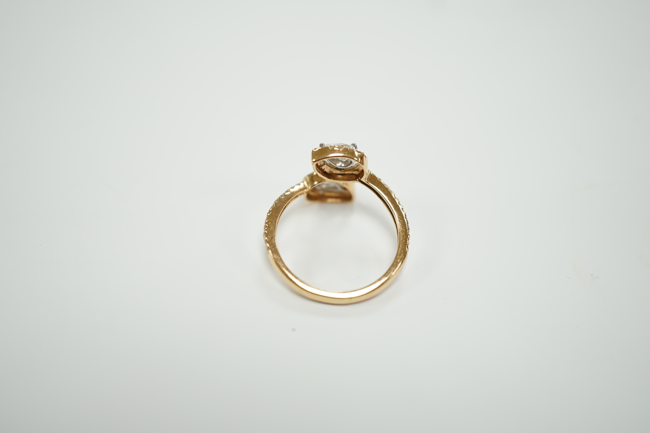 A modern 18k and two stone pear cut diamond set cross-over ring, with diamond chip border and - Image 5 of 5