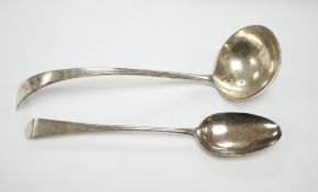 An Edwardian silver Old English pattern soup ladle, London, 1902 and a George III basting spoon,