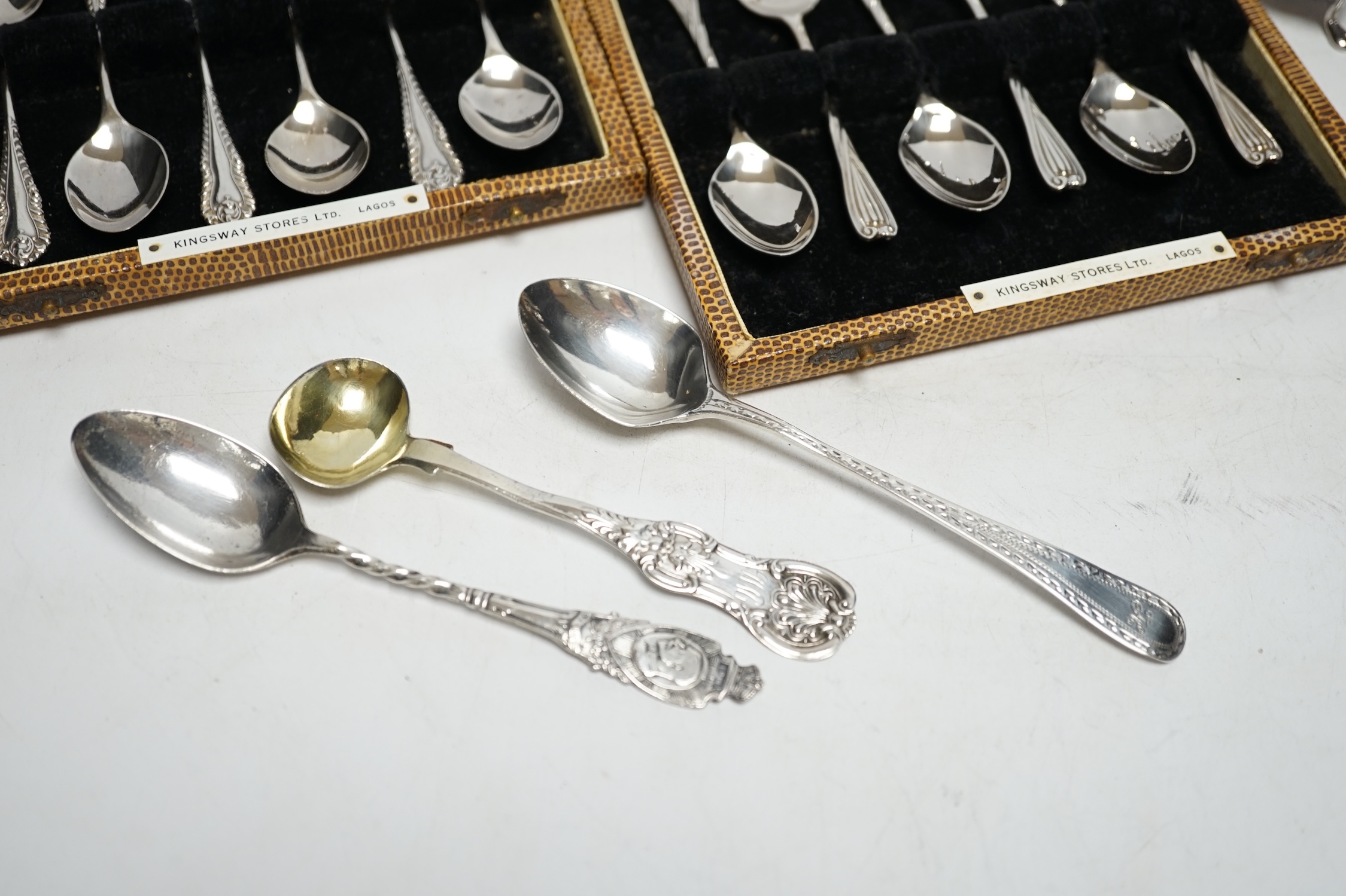 Two cased sets of six silver coffee spoons, a set of four silver condiments, two silver napkin - Image 2 of 6