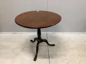 A George III mahogany tilt top tripod tea table, diameter 74cm, height 68cm