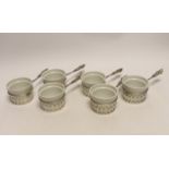 A set of six American sterling mounted handled ceramic soufflé holders, length 17cm.