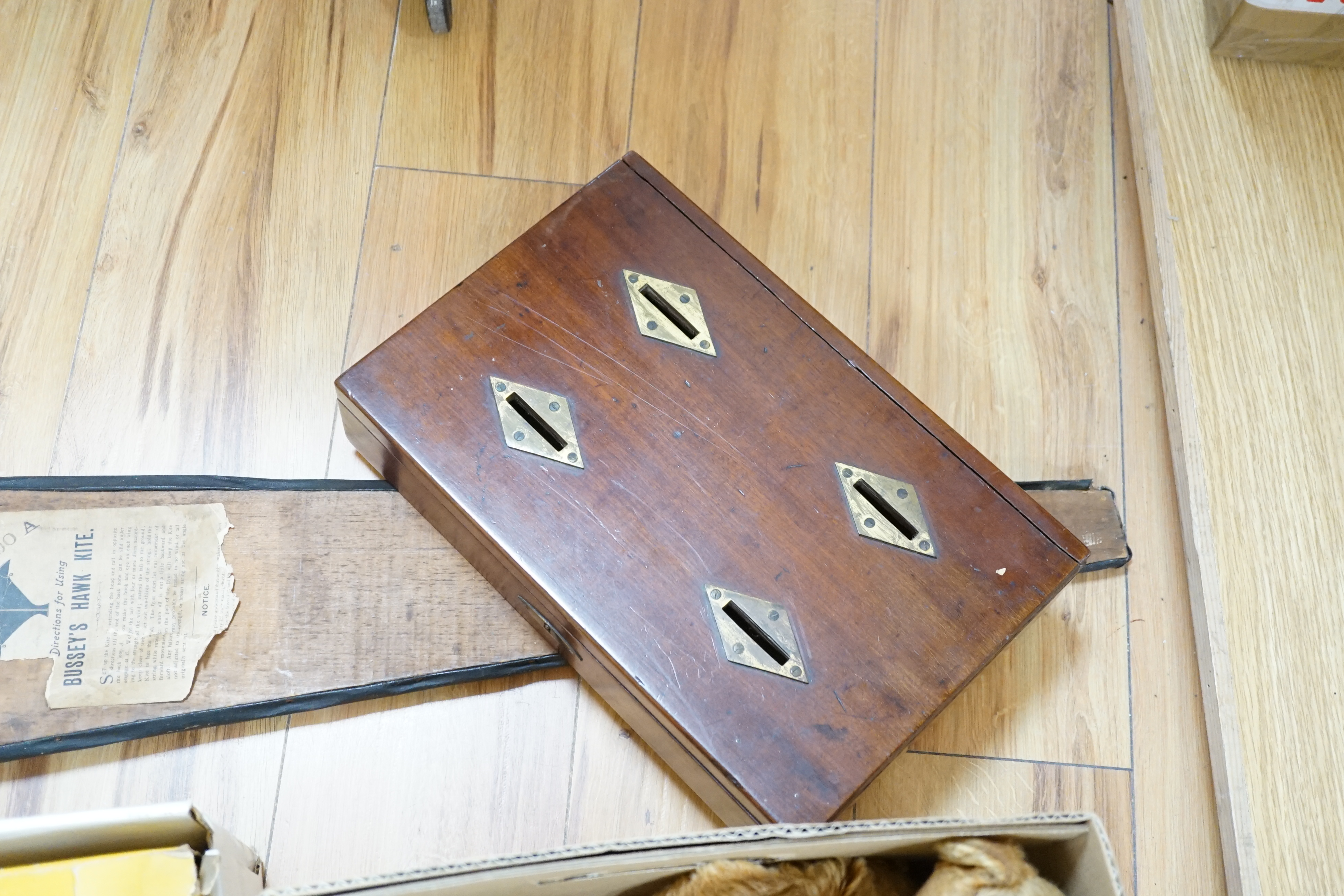 An early 20th century cased Bussey’s Hawk kite, a black walkie talkie doll, a four slot money box, - Image 2 of 8