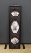A Chinese famille rose porcelain panel, housed in a carved hardwood frame, 106cm high