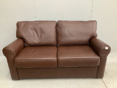 A modern brown leather two seater sofa bed, width 160cm, depth 80cm, height 86cm