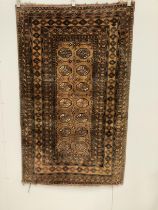 A Bokhara gold ground rug, 194 x 120cm