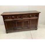 A small 18th century oak low dresser, width 152cm, depth 46cm, height 87cm