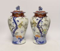 A pair of Japanese Imari vases and covers, by Fukugawa, koransha mark, 32cm high