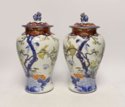 A pair of Japanese Imari vases and covers, by Fukugawa, koransha mark, 32cm high