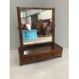 A George III mahogany bow front toilet mirror, width 46cm, depth 20cm, height 54cm