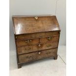 A George III oak bureau, width 91cm, depth 52cm, height 101cm