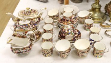 An early 19th century Derby Japan pattern part tea and coffee set, including cups and saucers,