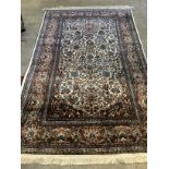 A North West Persian ivory ground rug, 220 x 136cm