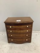 A 19th century miniature mahogany bowfront chest of four drawers, width 29cm, depth 20cm, height