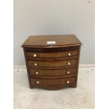 A 19th century miniature mahogany bowfront chest of four drawers, width 29cm, depth 20cm, height