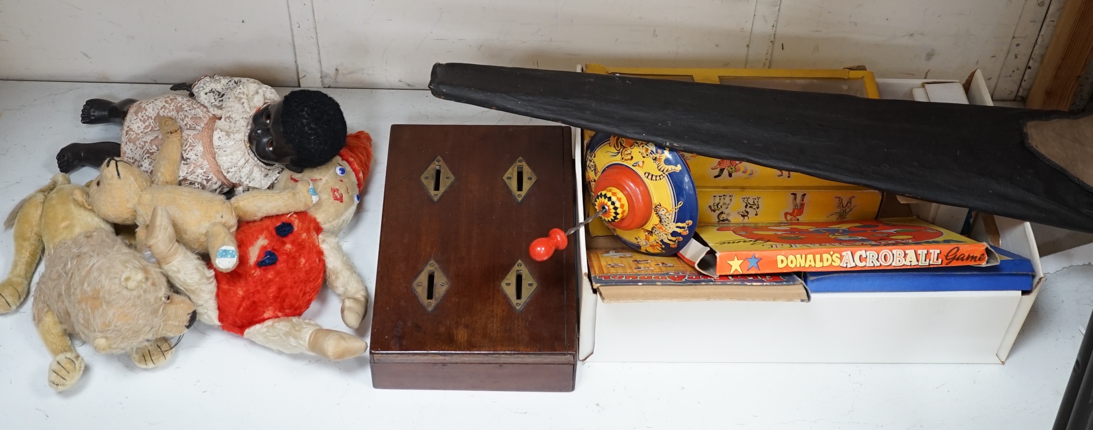 An early 20th century cased Bussey’s Hawk kite, a black walkie talkie doll, a four slot money box, - Image 5 of 8