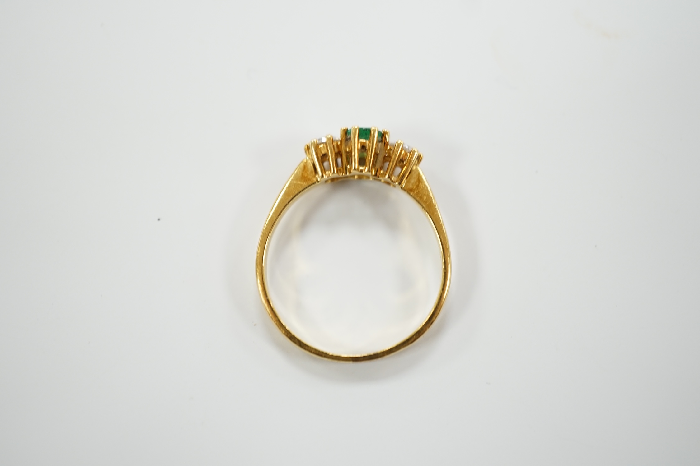 A modern 18ct gold, emerald and diamond set three stone ring, size P, gross weight 3.2 grams. - Image 3 of 5