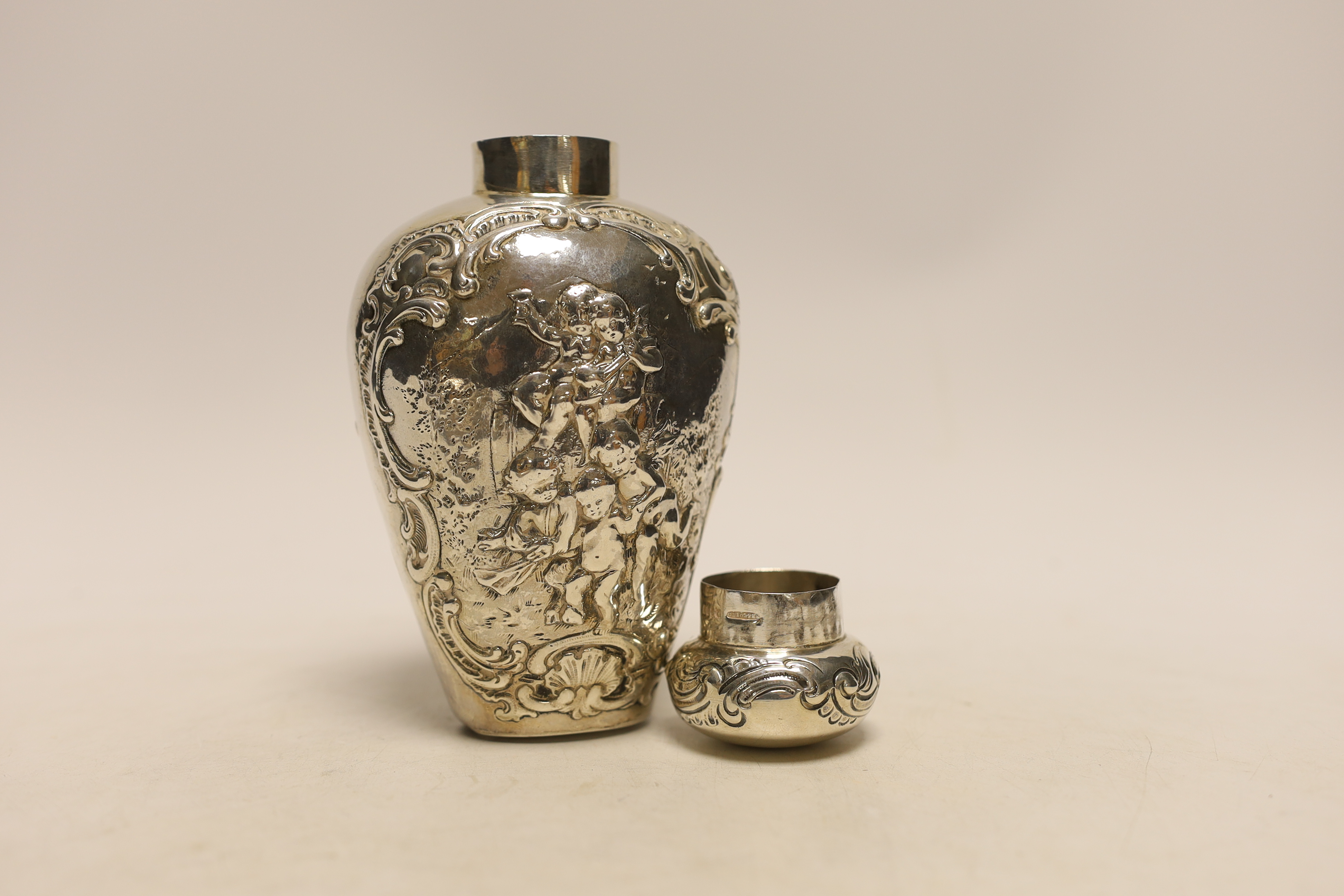 An Edwardian continental embossed silver tea caddy? and cover decorated with amorini, makers stamp - Image 2 of 3
