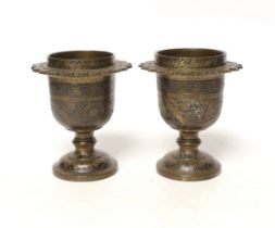 A pair of late 19th century Indian brass vases, 12cm high