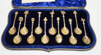 A set of twelve Edwardian silver gilt 'Greater Britain' souvenir spoons, Edward Barnard & Sons,