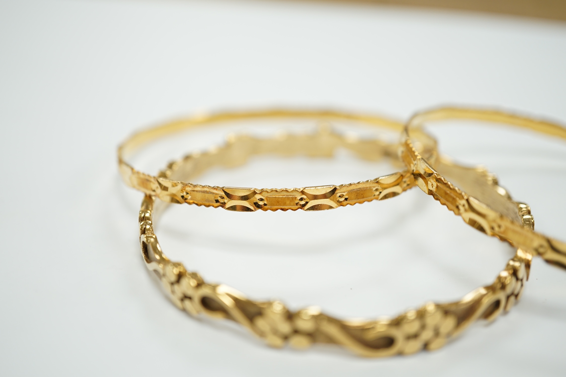 Two 22k bangles, 19.6 grams and a 9ct gold bangle, 20.6 grams. - Image 7 of 7