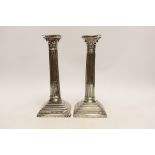 A pair of Edwardian silver Corinthian column candlesticks, by Jones & Crompton, Birmingham, 1903,