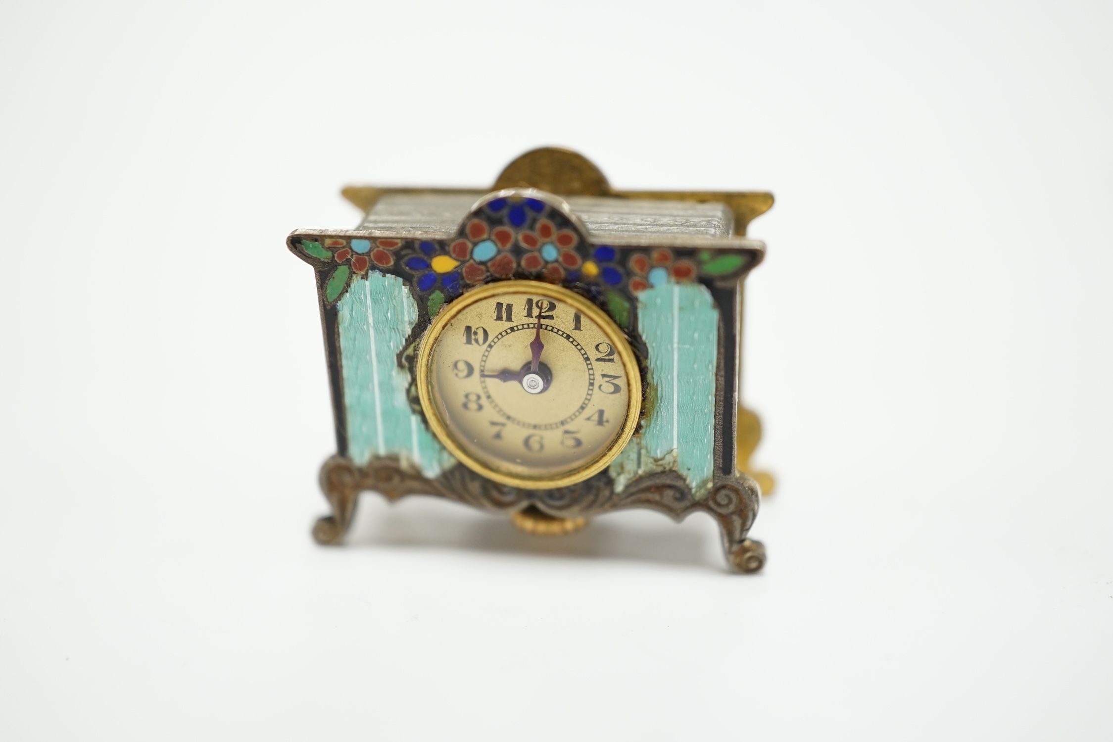 A miniature enamel timepiece modelled as a mantle clock, with watch movement, 2cm high, in fitted - Image 3 of 5