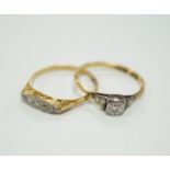 Two early to mid 20th century 18ct, plat and diamond set rings, including graduated five stone,