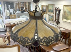 An early 20th century stained glass hanging lamp shade with applied metalwork decoration, shade 56cm