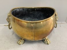 A 19th century Dutch oval and brass coal bin with lion mask ring handles, width 54cm, depth 40cm,