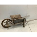 A vintage provincial iron bound wood wheelbarrow, length 180cm