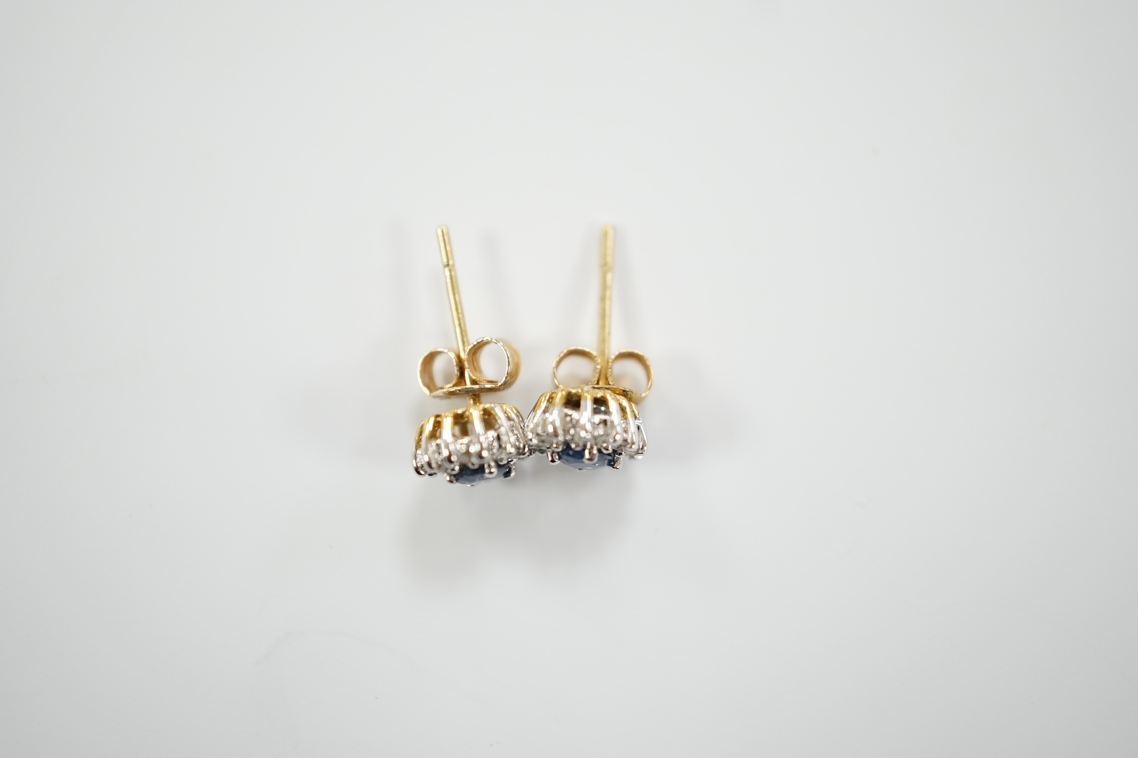 A pair of yellow metal, sapphire and diamond set oval cluster ear studs, 7mm, gross weight 1.3 - Image 3 of 4