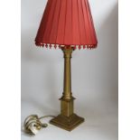 A brass column table lamp, 65cm high