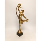 P. Sega, a gold painted figure of a lady on a marble base, 44cm