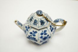 A Chinese blue and white octagonal teapot and cover with gilt metal mounts and a blue and white