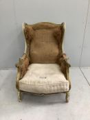 A 19th century French painted parcel gilt armchair requiring re-upholstery, width 69cm, depth