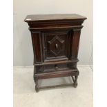 An 18th century oak spice cabinet, on later stand, width 58cm, depth 33cm, height 93cm