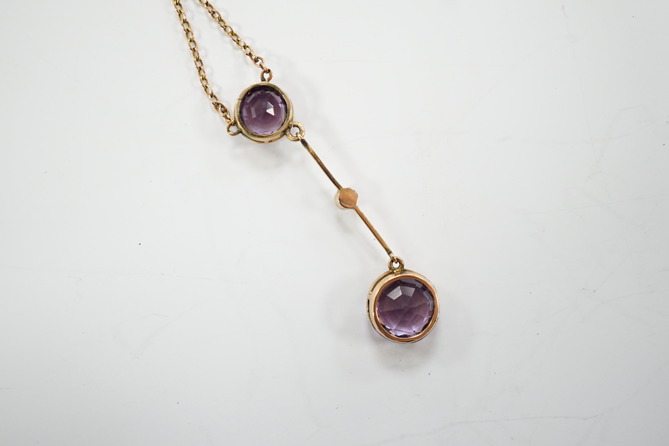 An Edwardian 9ct, two stone amethyst and single stone seed pearl set drop pendant necklace, gross - Image 9 of 9