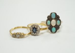 Three assorted 18ct and gem set rings, including five stone white opal and diamond chip set, gross